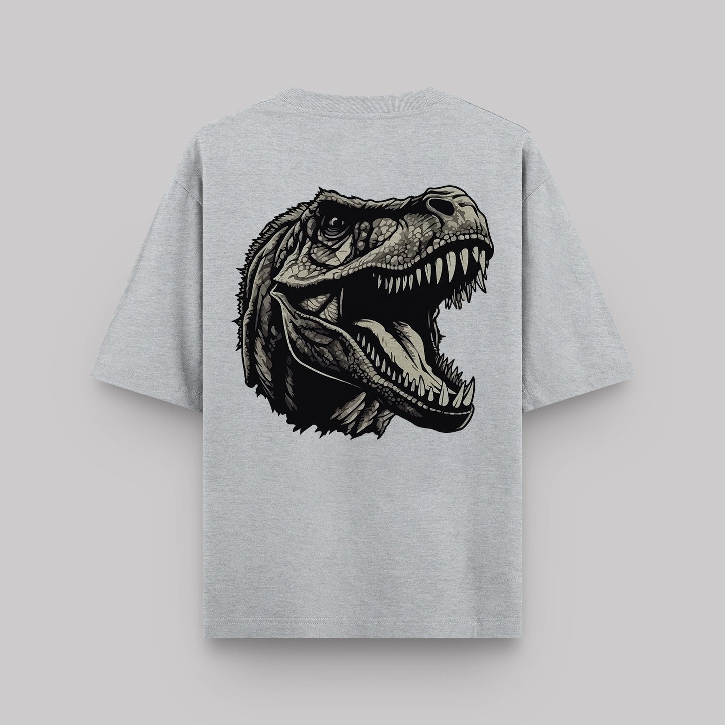 Gray t-shirt with a dinosaur graphic on the back against a light gray background