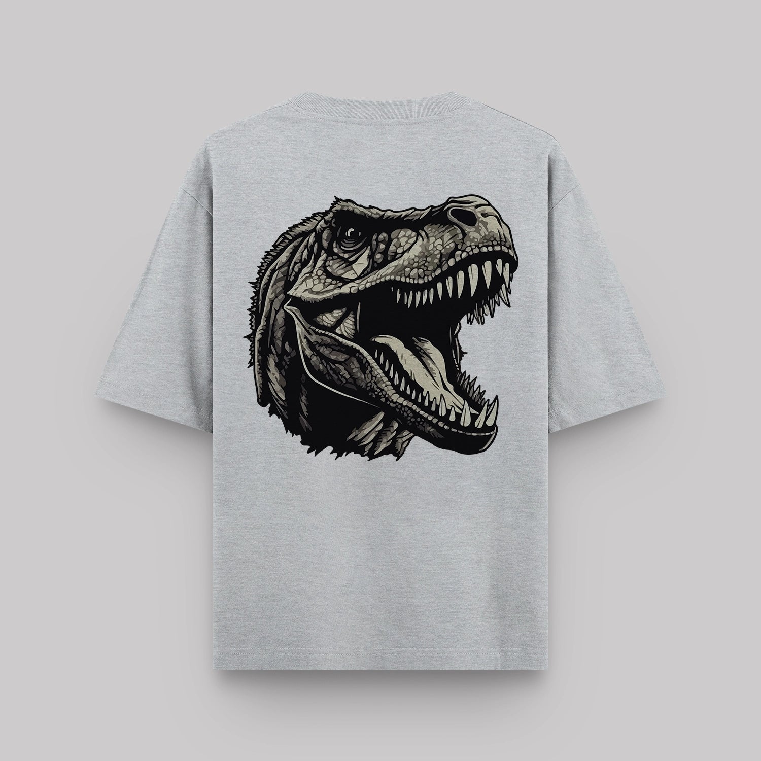 Gray t-shirt with a dinosaur graphic on the back against a light gray background