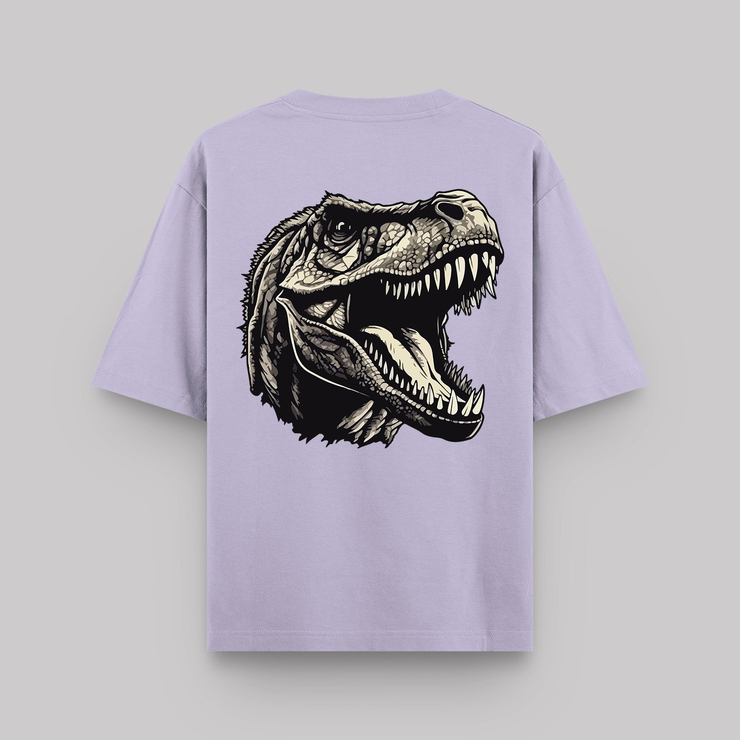 Purple t-shirt with a dinosaur graphic on the back against a light gray background
