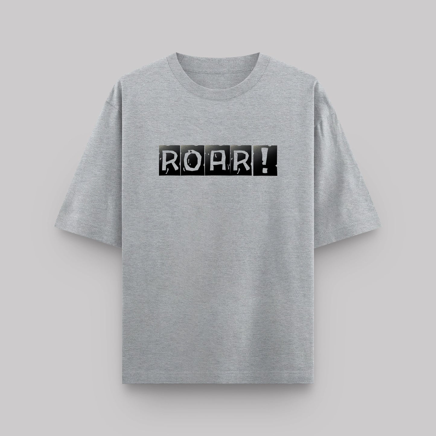 Gray t-shirt with 'ROAR!' print on a light gray background