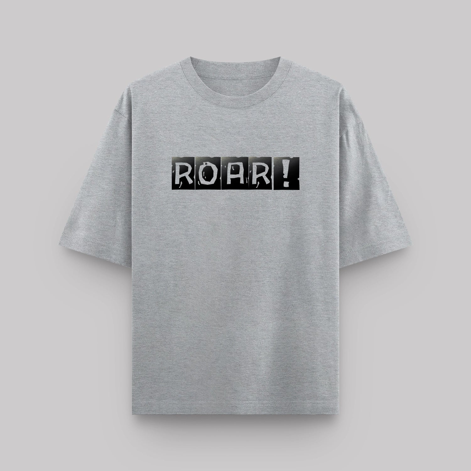 Gray t-shirt with 'ROAR!' print on a light gray background