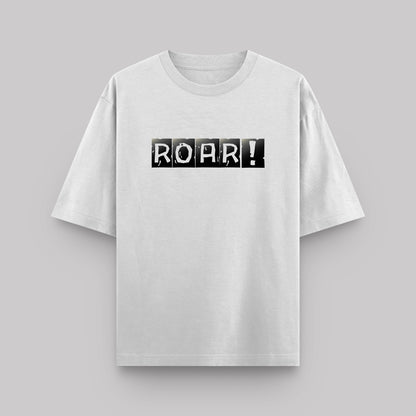 White t-shirt with 'ROAR!' print on a gray background
