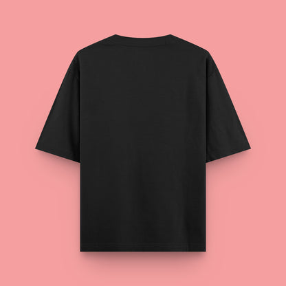 Black t-shirt on a pink background
