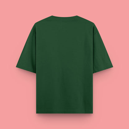 Green t-shirt on a pink background