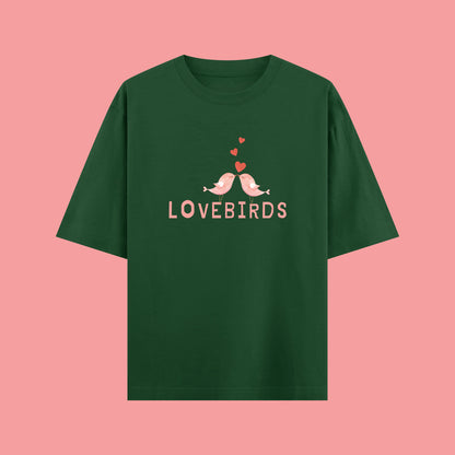 Green t-shirt with 'LOVEBIRDS' design on a pink background