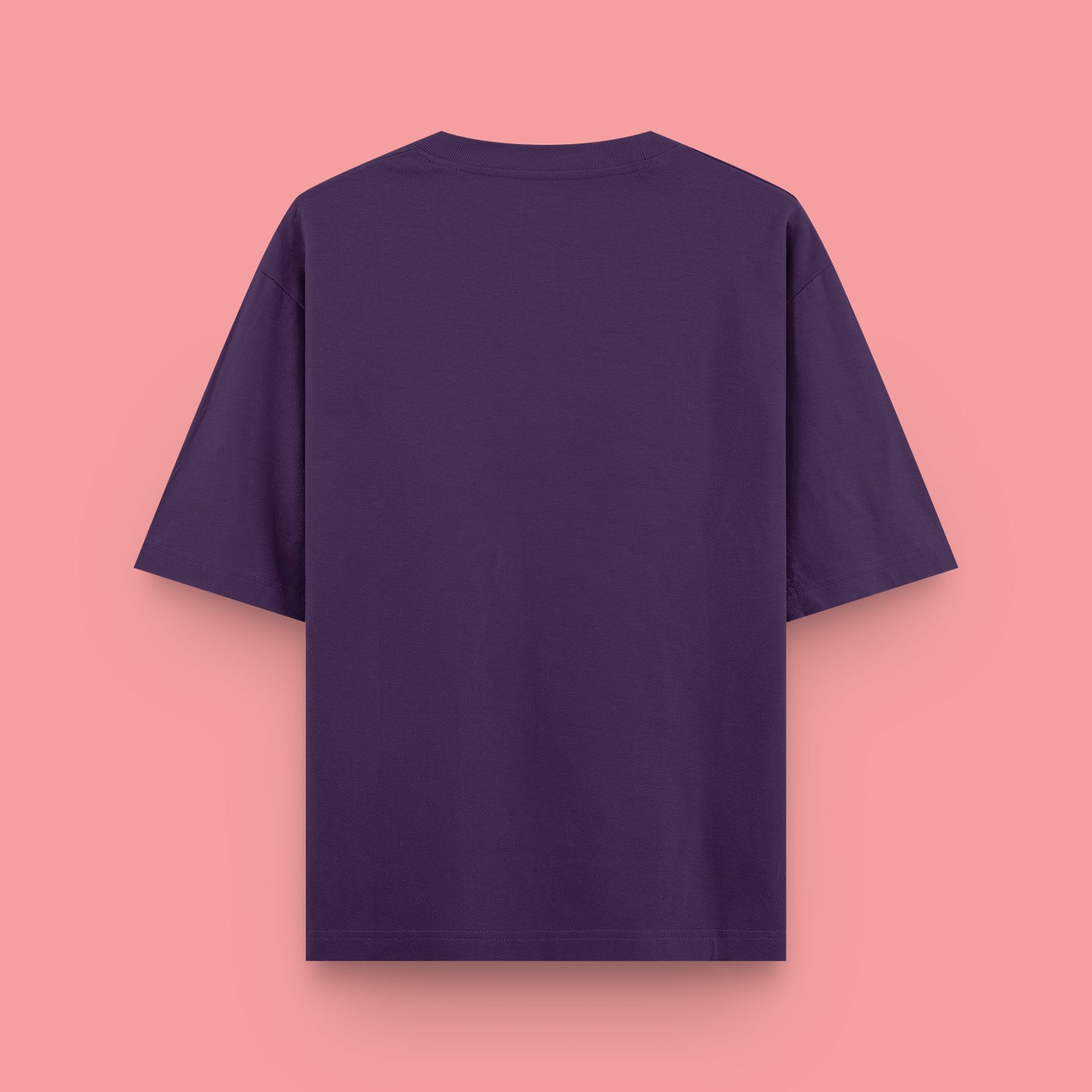 Purple t-shirt on a pink background