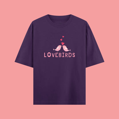 Purple t-shirt with 'LOVEBIRDS' design on a pink background