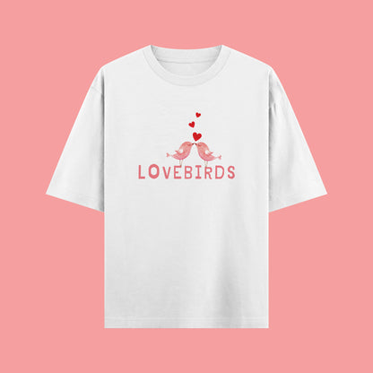 White t-shirt with 'LOVEBIRDS' design on a pink background